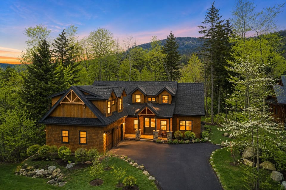Charming mountain retreat with wooded views and a warm, inviting glow