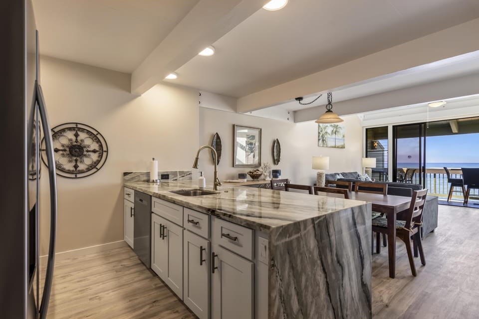 Spacious kitchen with modern finishes and open dining area
