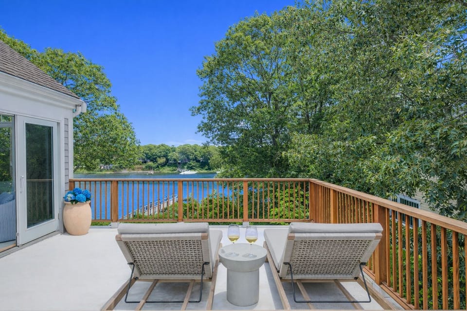 Private deck with 2 lounge chairs. 