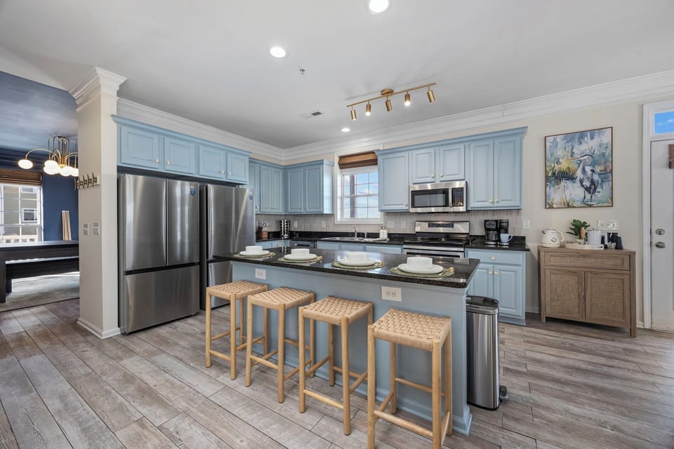 Open kitchen with two full-size refrigerators, ideal for large groups.