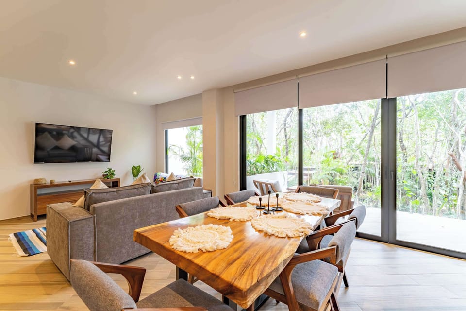 Living & Dining | Jungle light, long table, evenings that linger