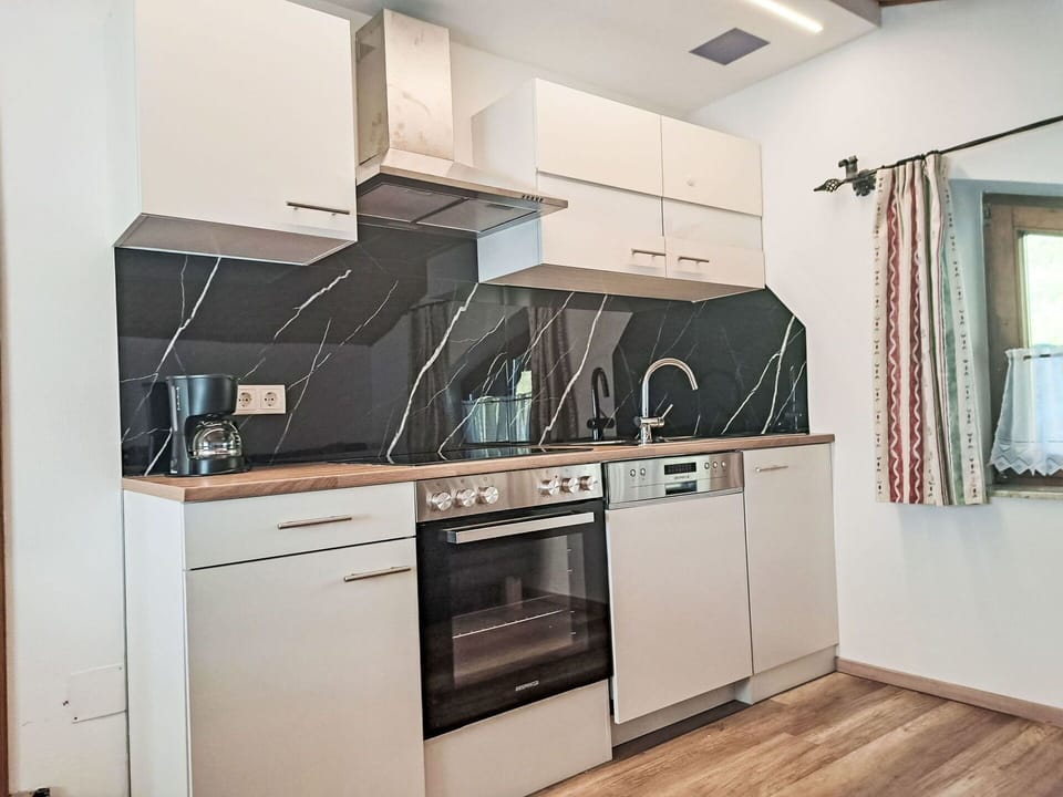 Kitchen Appliance, Countertop, Kitchen, Wood, Flooring, Interior Design, Major Appliance, Furniture, Cabinetry, Floor