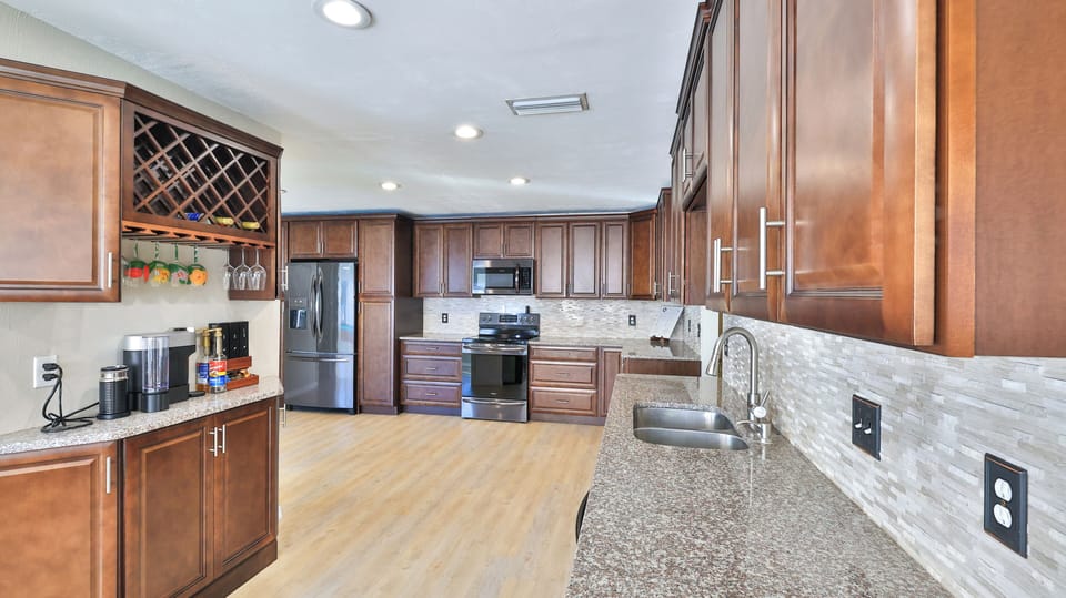 Fully equipped kitchen with stainless appliances, Nespresso Coffee Bar & Frother