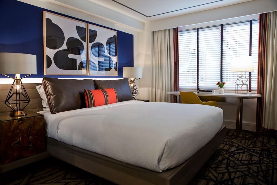 Sink into plush bedding and enjoy a serene, stylish retreat.
