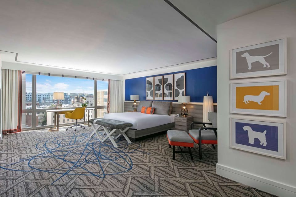 Wake up to skyline views in this airy king retreat.