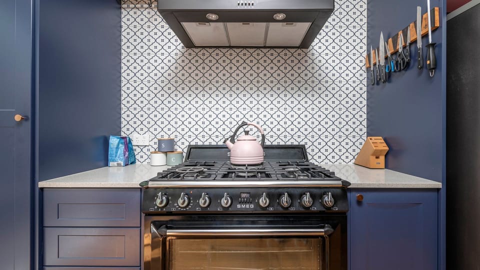 Modern kitchen with premium appliances and plenty of counter space.