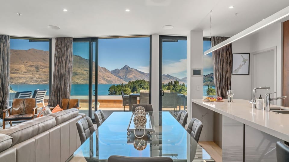 Dining table suitable for up to 6 guests; offering stunning lake and mountain views. 