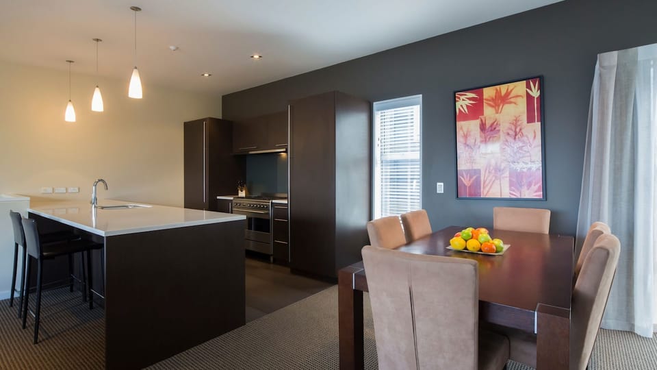Dining table and kitchen. 
