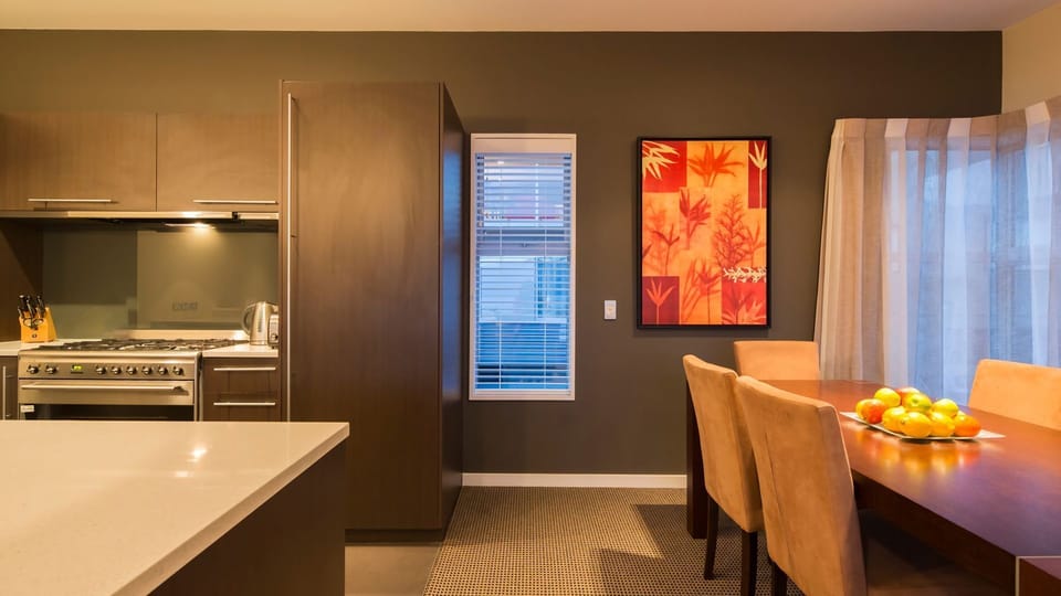 Dining table and kitchen. 