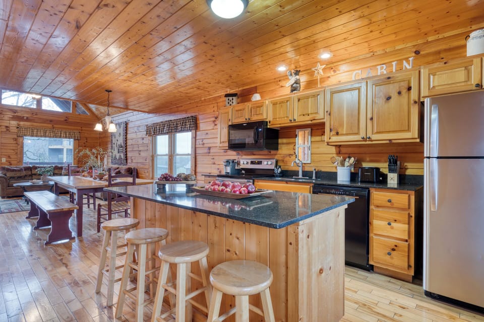 Kitchen island with bar seating and spacious countertops.