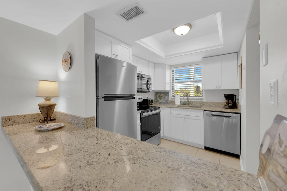 Granite countertops in your kitchen at Villa Del Mar 303