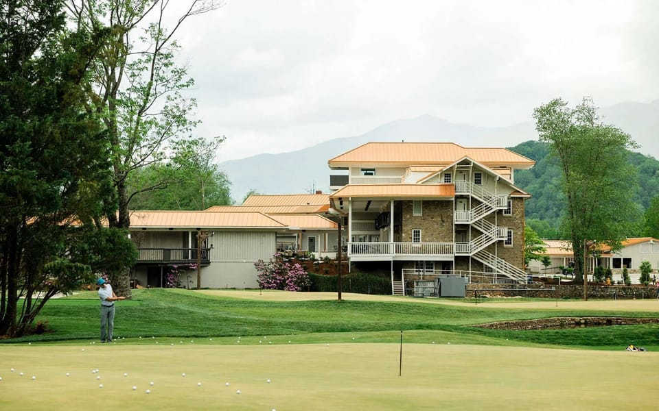 Practice green with scattered golf balls