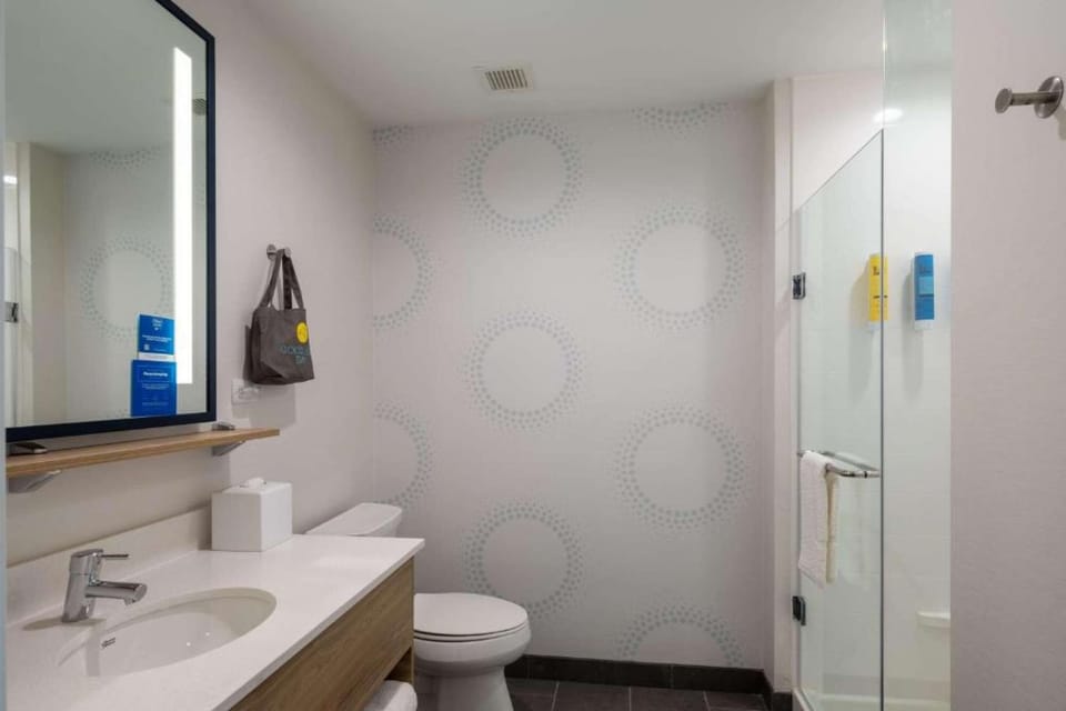 Private bathroom with a walk-in shower