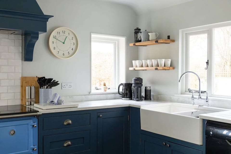 Farmhouse sink and bright kitchen corner