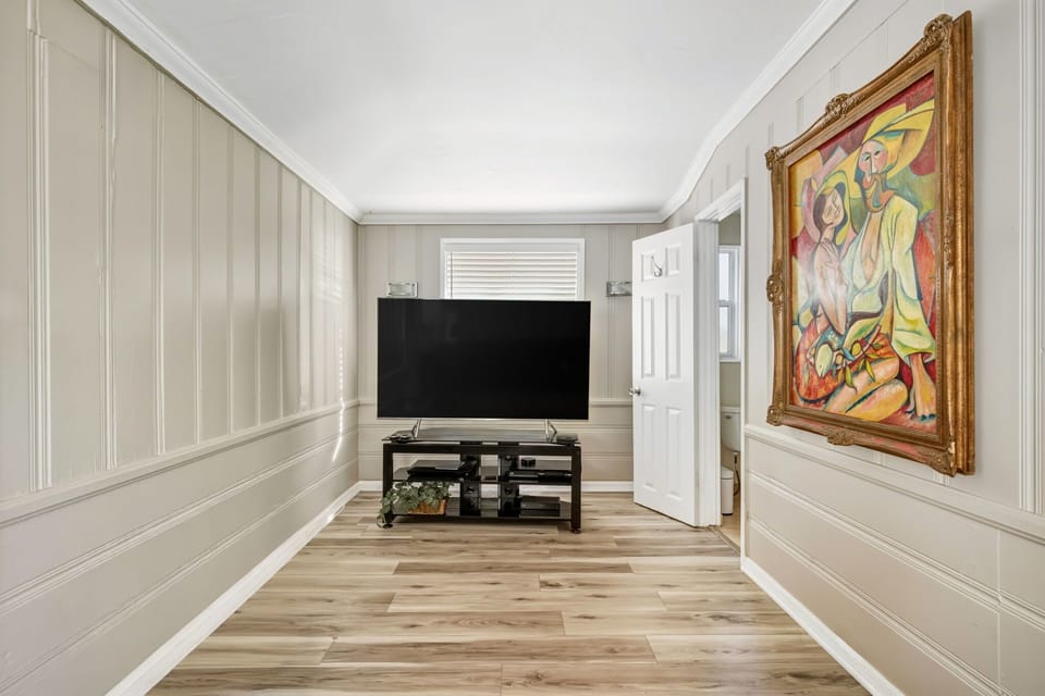 A relaxed media area perfect for movie nights, quiet downtime, and winding down after a full day at the beach.