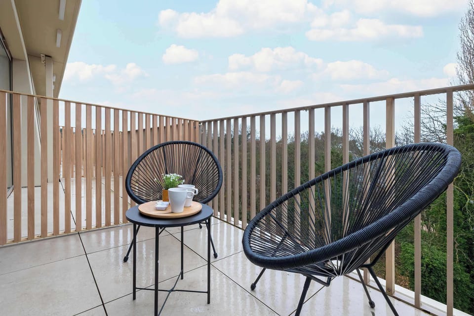 The balcony's peaceful ambiance is ideal for unwinding.