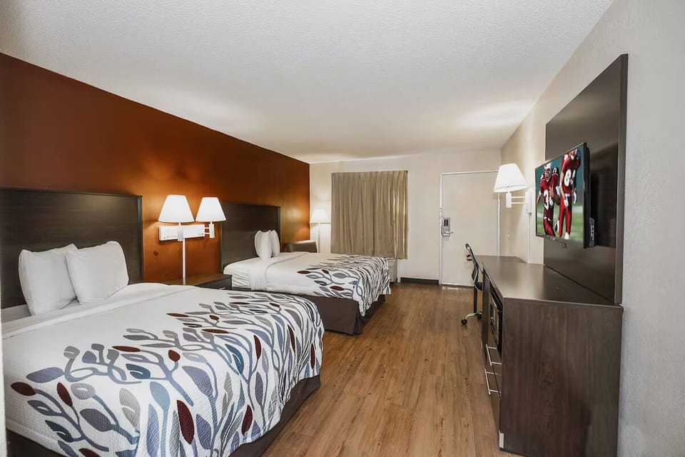 Settle into bright comfort with two queens and room to breathe.