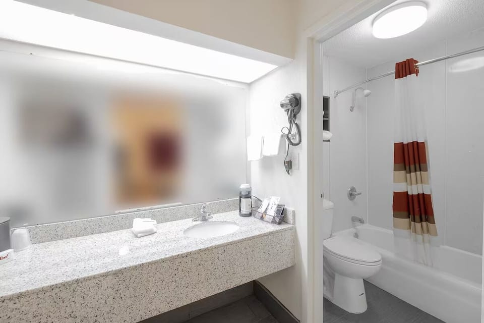 Refresh easily with bright vanity space and a full shower-tub.