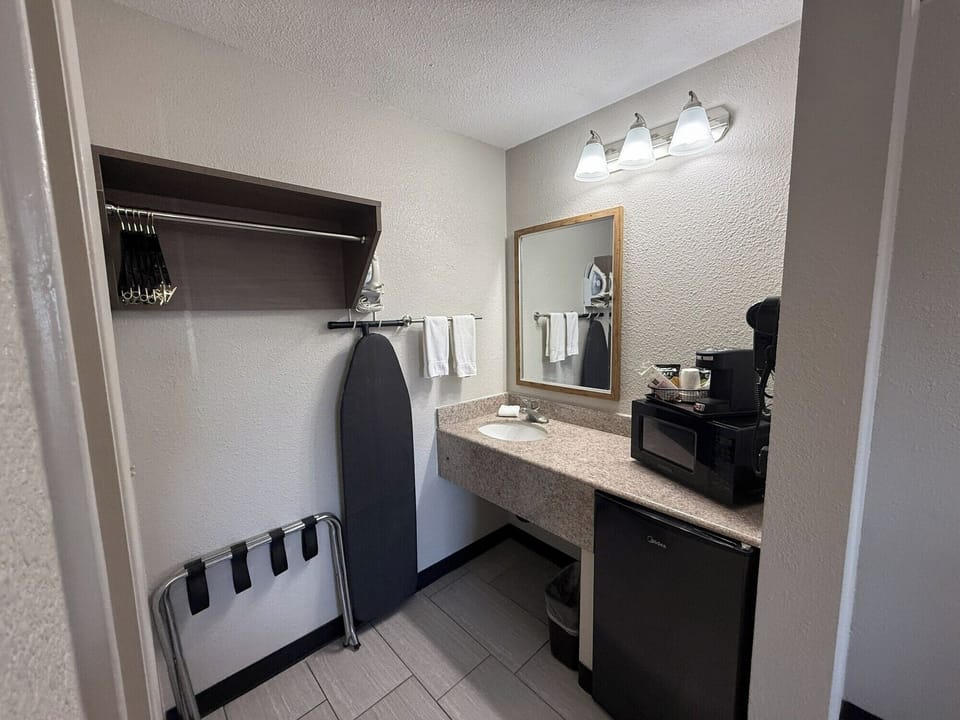 Get ready quickly with wide vanity space and bright mirror lighting.