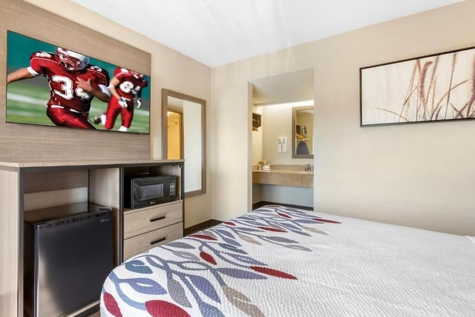 Recharge in a calm room designed for effortless, cozy stays.