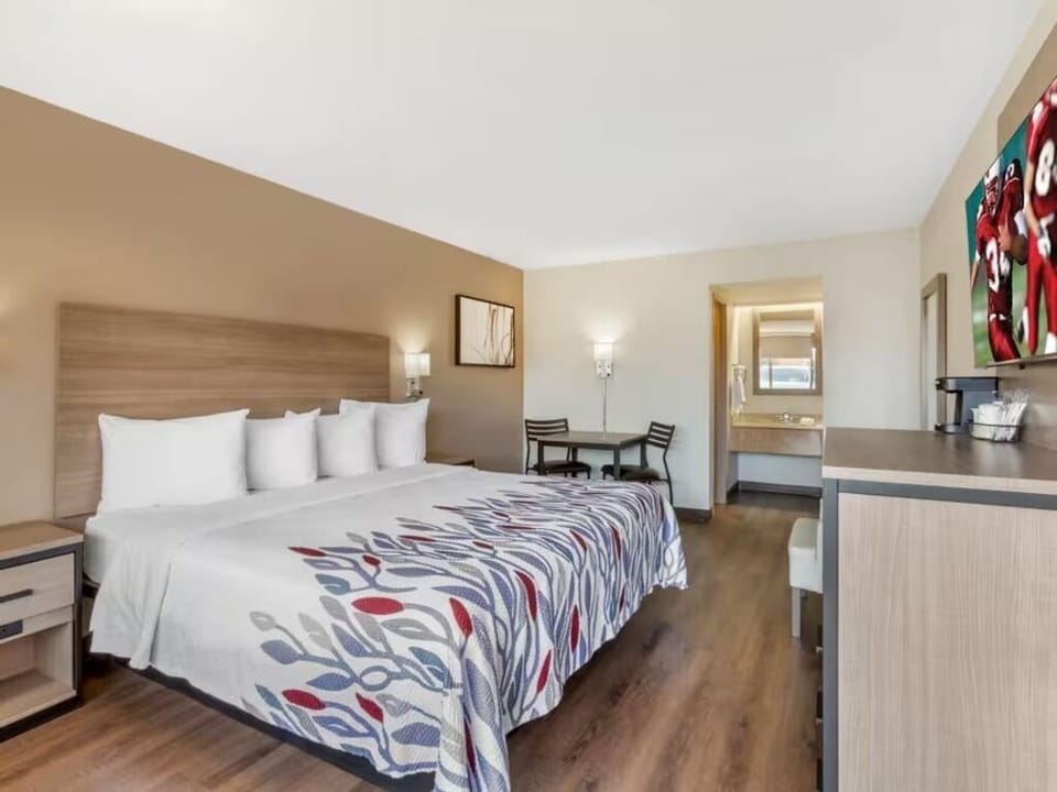 Unwind on crisp linens in a bright, spacious retreat.