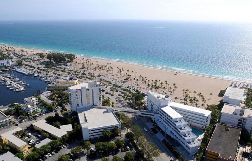 Take in aerial views of beach, marina, and resort grounds.