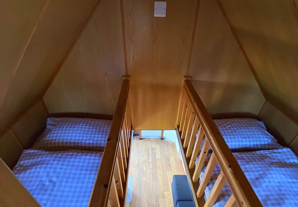 Three single beds ( First floor)