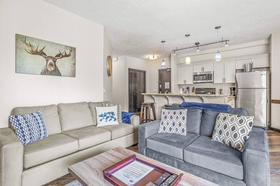 Spacious living area with two comfy sofa beds (double & twin size) for extra sleeping arrangements.