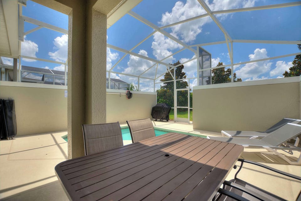Take a dip in the private screened pool