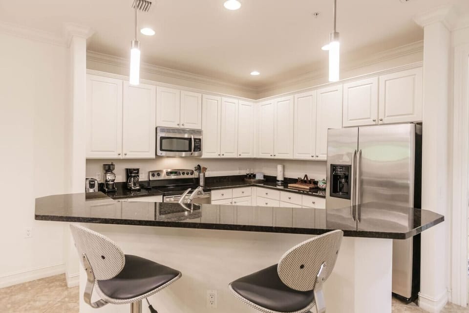 Large island/bar area with seating.