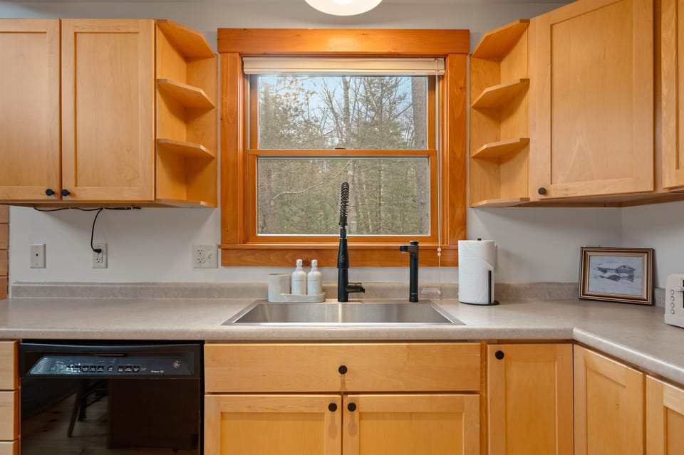 [First Floor, Kitchen] Even though our water has been tested and is safe to consume, we upgraded it, anyway.  Introducing the Waterdrop Reverse Osmosis System.  Simply twist the button on the Intelligent Faucet to dispense your desired amount.