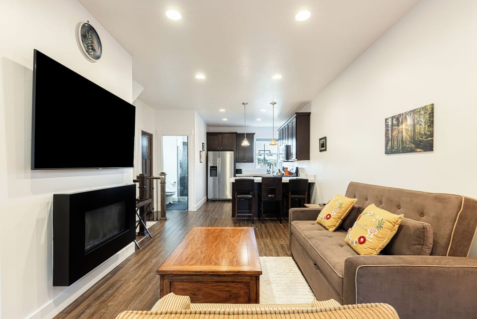 55" Samsung TV with Apple TV and an electric fireplace