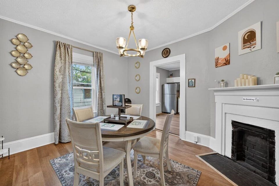 Dinning Room features seating for up to four and one high chair. (Fireplace is non-functional)