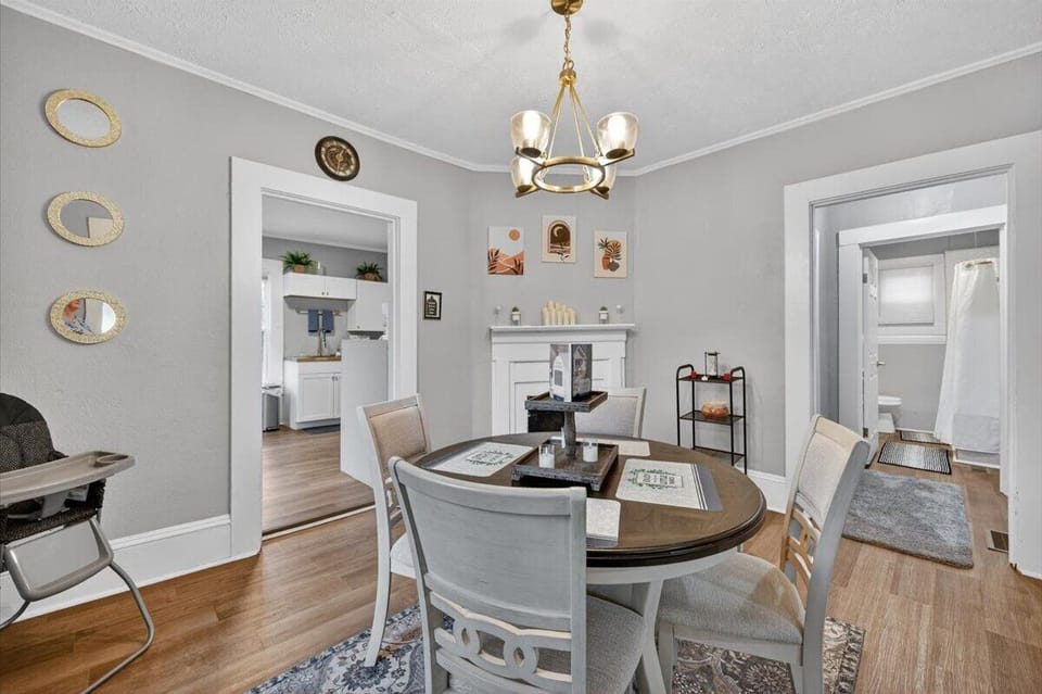 Dinning Room features seating for up to four and one high chair. (Fireplace is non-functional)