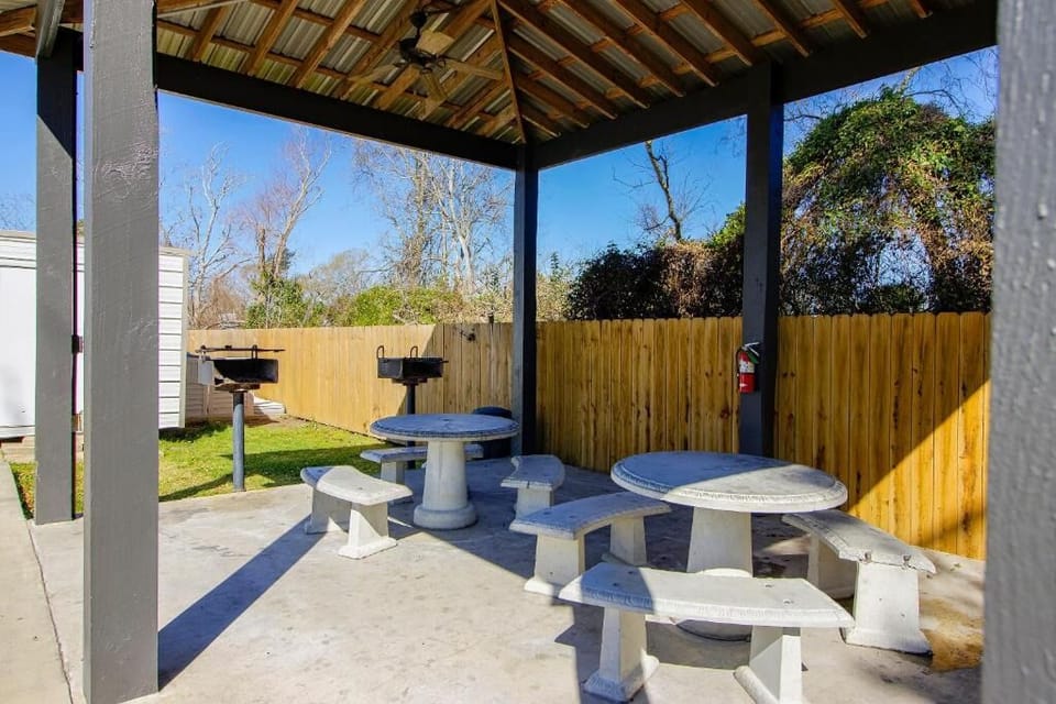 Gather under the covered pavilion for relaxed outdoor grilling.