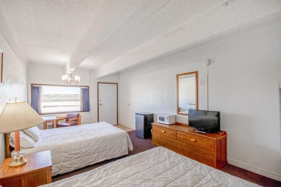 Step into a spacious double-bed room made for rest.