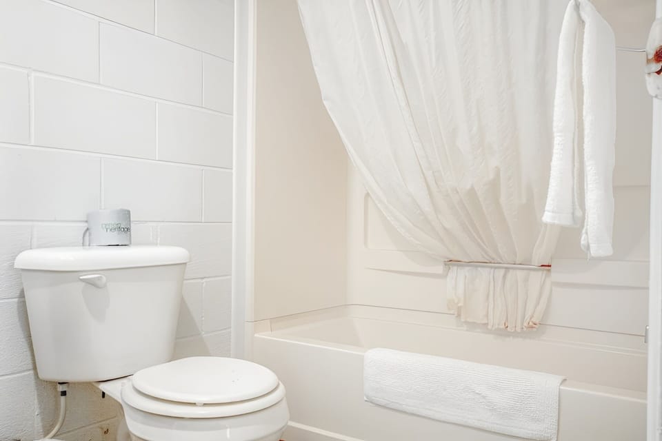 Refresh with a warm bath and plush towels ready.