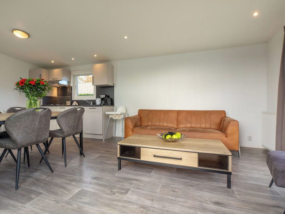 Apartment, Hardwood, Wood Stain, Wood Flooring, Design, Living Room, Couch, Houseplant, Plank