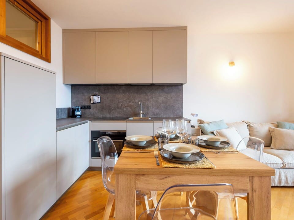 Furniture, Kitchen, Kitchen Appliance, Interior Design, Countertop, Flooring, Wall, Cabinetry, Major Appliance, Wood