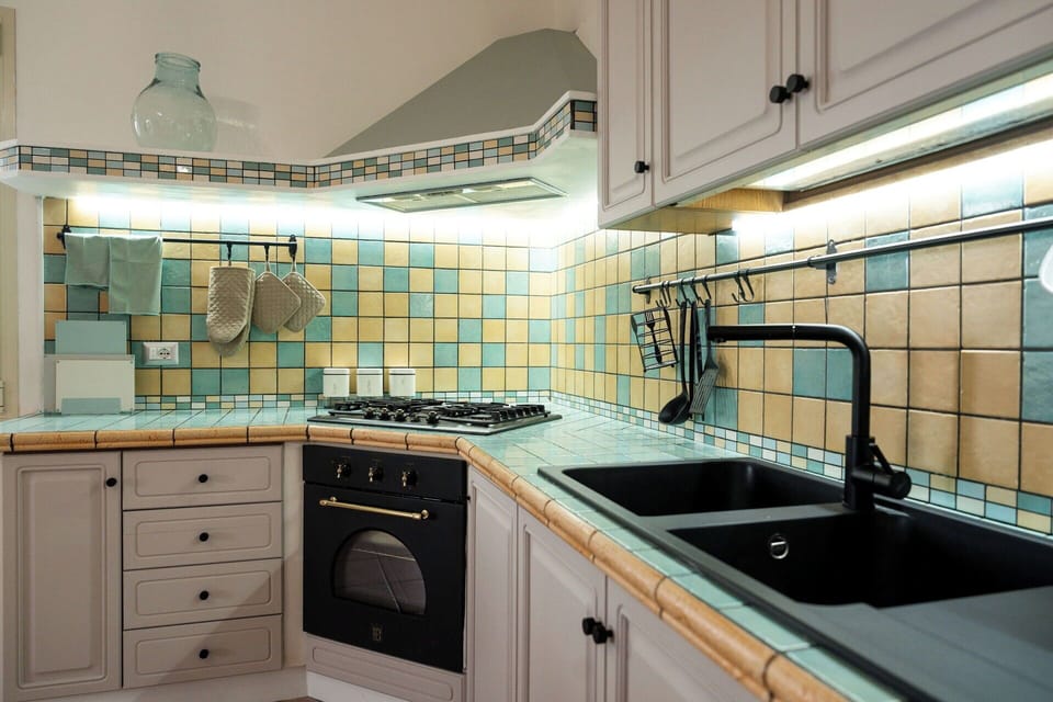 Kitchen, Countertop, Interior Design, Plumbing Fixture, Flooring, Tap, Tile, Kitchen Appliance, Plumbing, Sink
