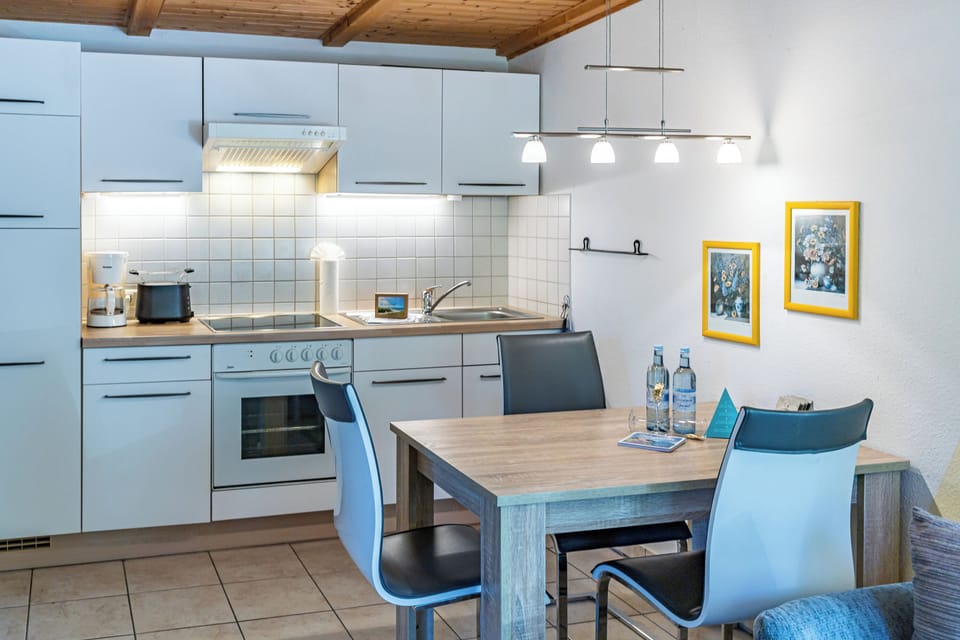 Modern Kitchen with Dining Area and Appliances