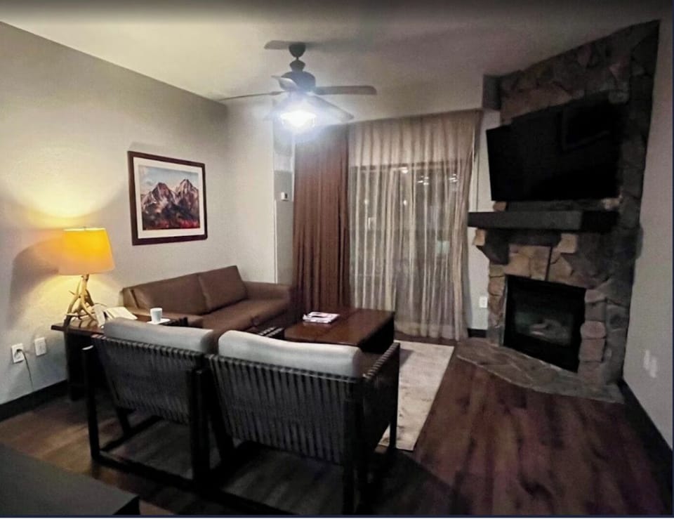 Fireplace in living room to warm you up after a day on the slopes