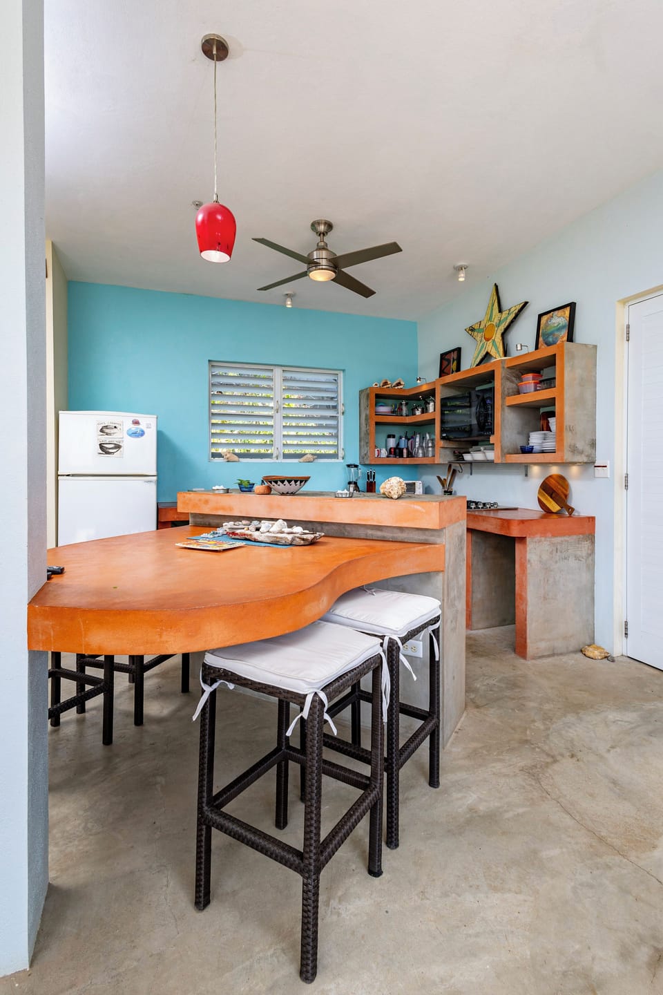 Kitchen with "Baby Grand" shaped dining table. 
