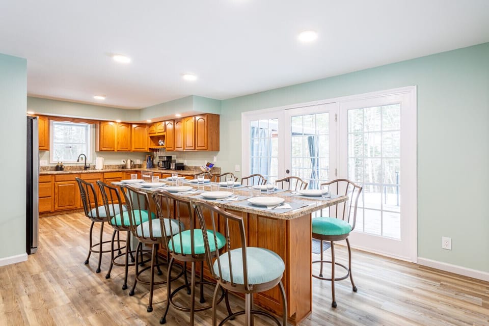 Spacious dining area with fully equipped kitchen and seating for groups