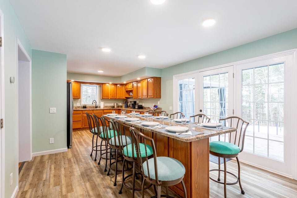 Spacious dining area with fully equipped kitchen and seating for groups