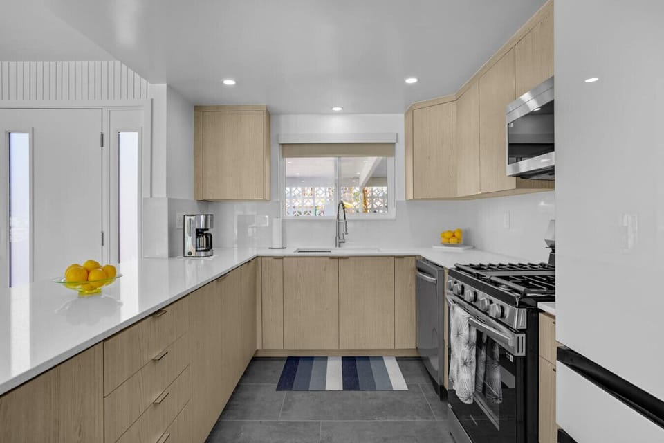 Fully equipped kitchen ready for home-cooked meals. Modern kitchen with stainless steel appliances