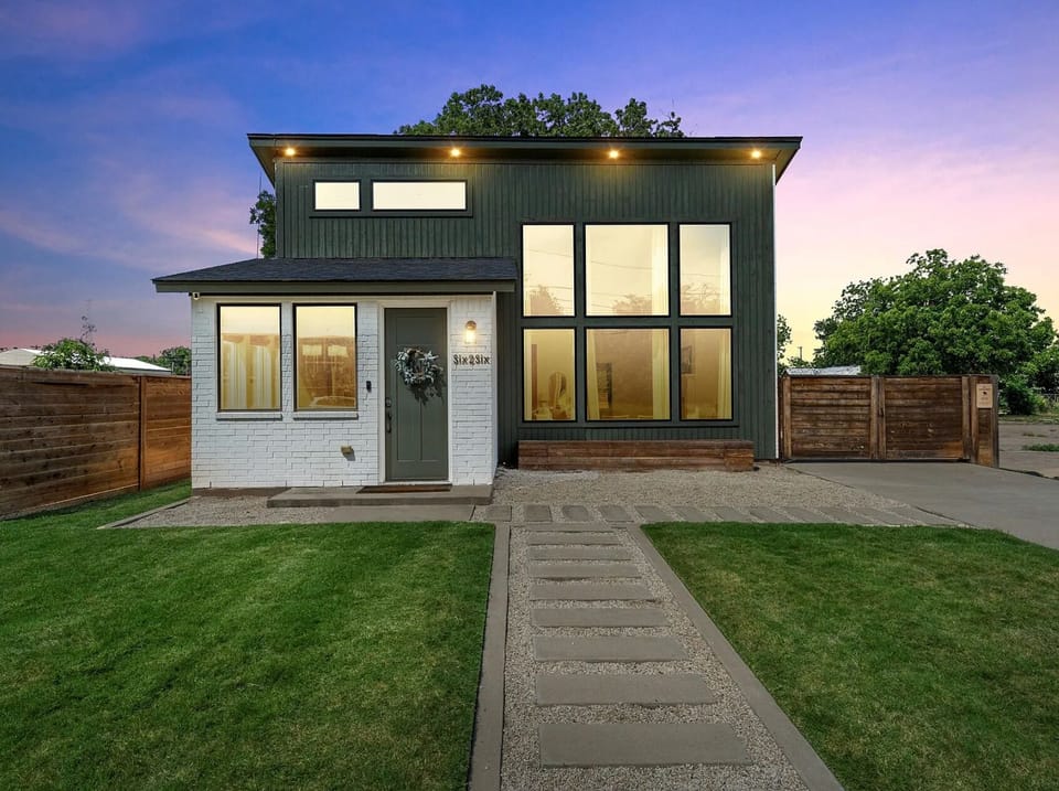 Front: The striking modern architecture sets the tone for the one-of-a-kind designer  experience