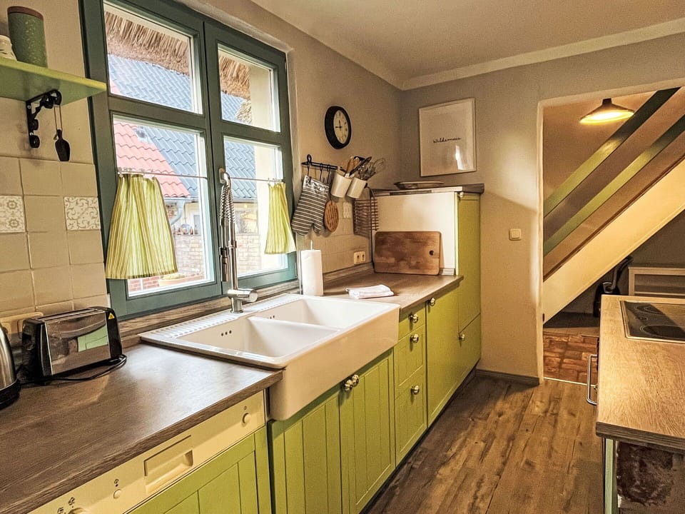 Wood, Kitchen, Interior Design, Flooring, Countertop, Furniture, Cabinetry, Home, Floor, Wood Stain