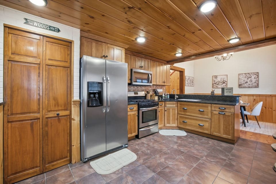 Fully equipped kitchen for cooking meals during your Lakes Region stay.