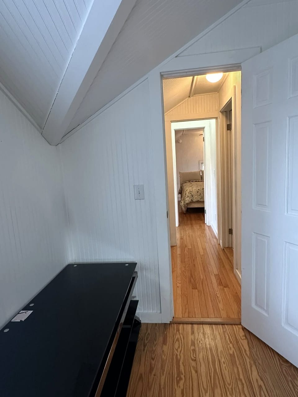 Hallway to Queen Bedrooms and Shared Bath